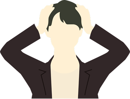 頭を抱える男性